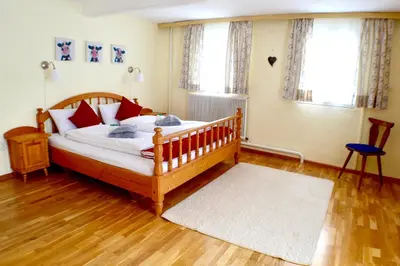 Ein Bett oder Betten in einem Zimmer der Unterkunft Gasthaus Chalet Mur