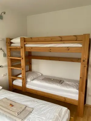 Ein Bett oder Betten in einem Zimmer der Unterkunft Deluxe Apartment DONNA