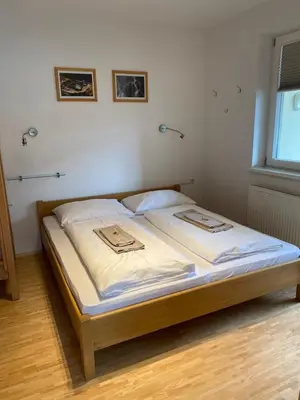 Ein Bett oder Betten in einem Zimmer der Unterkunft Deluxe Apartment DONNA