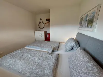 Ein Bett oder Betten in einem Zimmer der Unterkunft Moser Jaggeihof