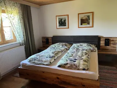 Ein Bett oder Betten in einem Zimmer der Unterkunft Apartment Hochsteinalm