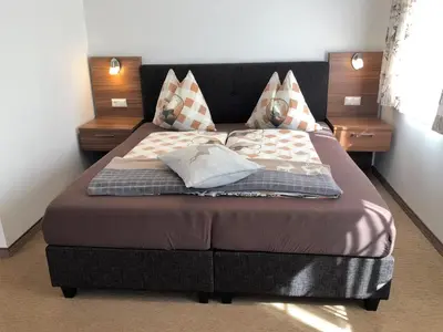 Ein Bett oder Betten in einem Zimmer der Unterkunft Urlaub am Bauernhof Rothof