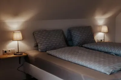Ein Bett oder Betten in einem Zimmer der Unterkunft AuerHias