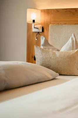 Ein Bett oder Betten in einem Zimmer der Unterkunft Hotel Schützenhof