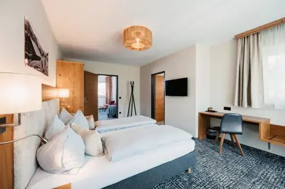 Ein Bett oder Betten in einem Zimmer der Unterkunft Hotel Schützenhof