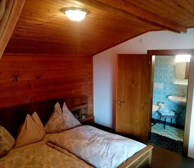 Ein Bett oder Betten in einem Zimmer der Unterkunft Kohlegghof
