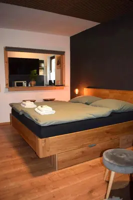 Ein Bett oder Betten in einem Zimmer der Unterkunft Ferienwohnung in Bad Goisern