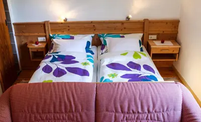 Ein Bett oder Betten in einem Zimmer der Unterkunft Hallmooshof
