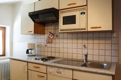 Küche/Küchenzeile in der Unterkunft Hallmooshof