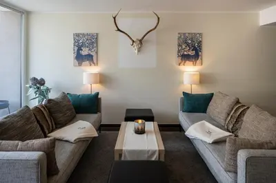 Ein Sitzbereich in der Unterkunft Apartment Bergwies