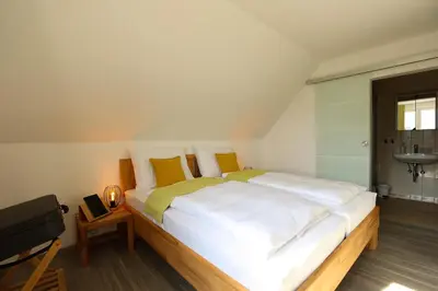 Ein Bett oder Betten in einem Zimmer der Unterkunft Panoramablick Scheifling