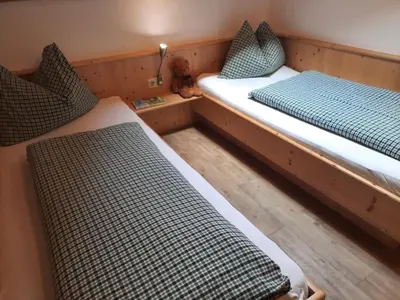 Ein Bett oder Betten in einem Zimmer der Unterkunft Bio-Bauernhof Vorderfromm