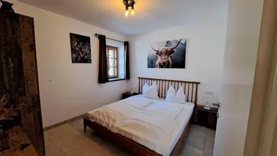 Ein Bett oder Betten in einem Zimmer der Unterkunft Haus.1800