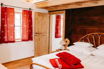 Ein Bett oder Betten in einem Zimmer der Unterkunft Speckleitengut