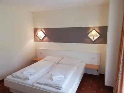 Ein Bett oder Betten in einem Zimmer der Unterkunft Haid Top 3