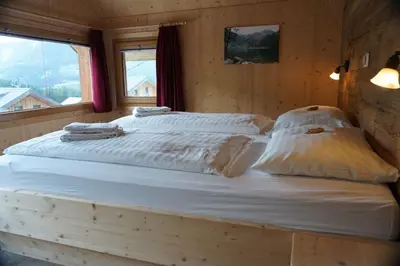 Ein Bett oder Betten in einem Zimmer der Unterkunft Murmeltierhütte