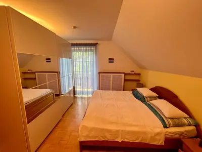 Ein Bett oder Betten in einem Zimmer der Unterkunft Ferienwohnung Martens Villa