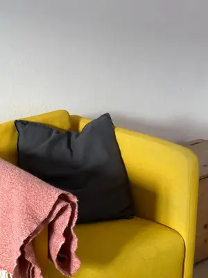 Ein Sitzbereich in der Unterkunft Tauglerei Doppelzimmer Bergamotte
