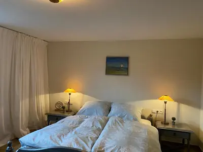 Ein Bett oder Betten in einem Zimmer der Unterkunft Blaue Lagune