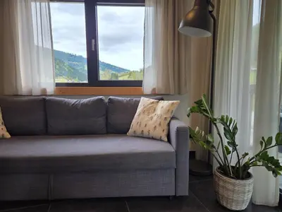Ein Sitzbereich in der Unterkunft Haus Amber