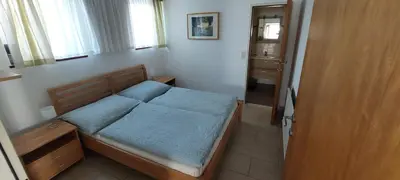 Ein Bett oder Betten in einem Zimmer der Unterkunft Apartment Hüttner
