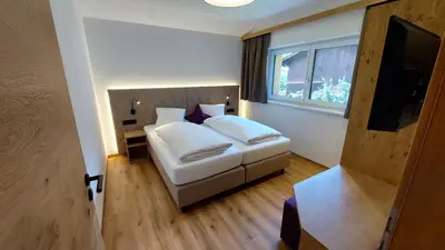 Ein Bett oder Betten in einem Zimmer der Unterkunft Appartement Schattauer