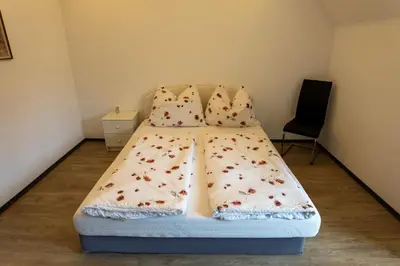 Ein Bett oder Betten in einem Zimmer der Unterkunft Glöcknerhaus