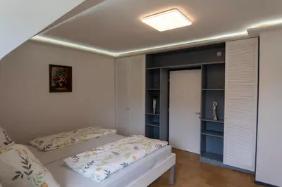 Ein Bett oder Betten in einem Zimmer der Unterkunft Glöcknerhaus