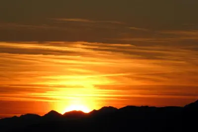Blick auf den Sonnenuntergang/Sonnenaufgang von der Ferienwohnung aus oder aus der Nähe