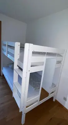 Ein Bett oder Betten in einem Zimmer der Unterkunft Almsternderl 2.0 - gemütliches Appartment in Gosau