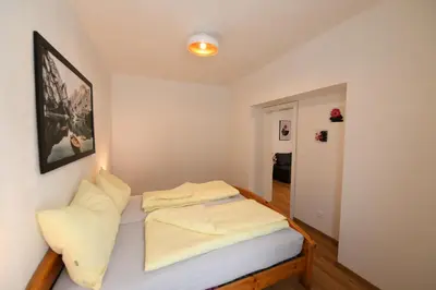 Ein Bett oder Betten in einem Zimmer der Unterkunft Ferienapartments 31erHaus