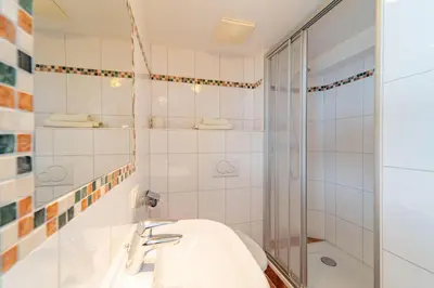 Ein Badezimmer in der Unterkunft Pension Braunhofer