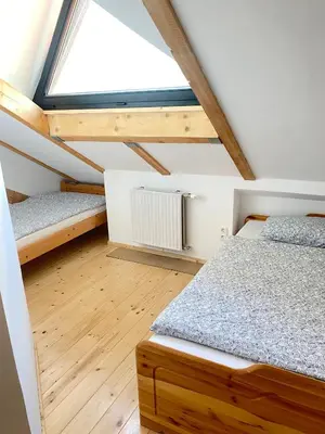 Ein Bett oder Betten in einem Zimmer der Unterkunft Apartment Steinwänd Top 8