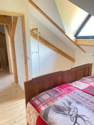 Ein Bett oder Betten in einem Zimmer der Unterkunft Apartment Steinwänd Top 8