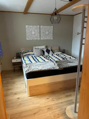 Ein Bett oder Betten in einem Zimmer der Unterkunft Kreischberg-Blick
