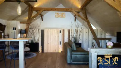 Ein Sitzbereich in der Unterkunft Chalet Münsterstadl