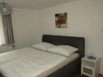 Ein Bett oder Betten in einem Zimmer der Unterkunft Ferienwohnung Marterer