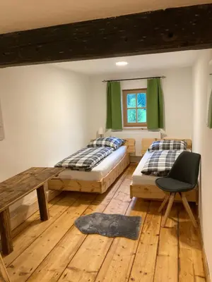 Ein Bett oder Betten in einem Zimmer der Unterkunft Bandltroga