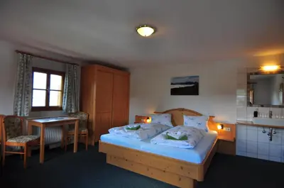 Ein Bett oder Betten in einem Zimmer der Unterkunft Pferdehof Oberegg