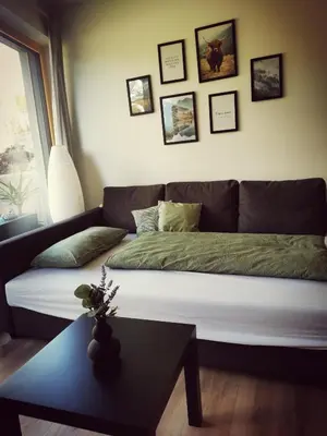 Ein Sitzbereich in der Unterkunft Jack's Apartment