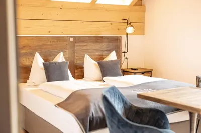 Ein Bett oder Betten in einem Zimmer der Unterkunft Penthouse Preber