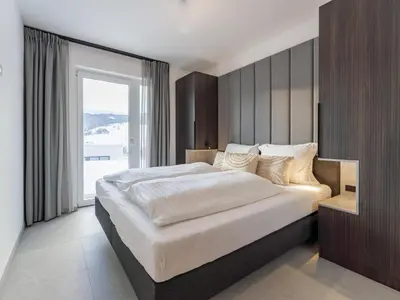 Ein Bett oder Betten in einem Zimmer der Unterkunft Grebenzen Top Chalet Mazzel