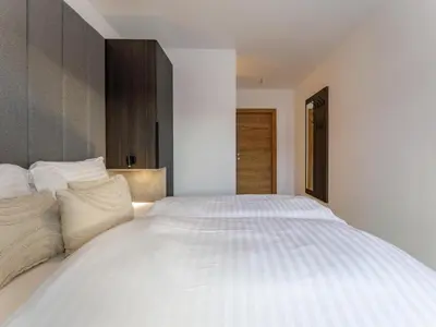 Ein Bett oder Betten in einem Zimmer der Unterkunft Grebenzen Top Chalet Mazzel
