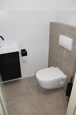 Ein Badezimmer in der Unterkunft Wohnung am Traunsee