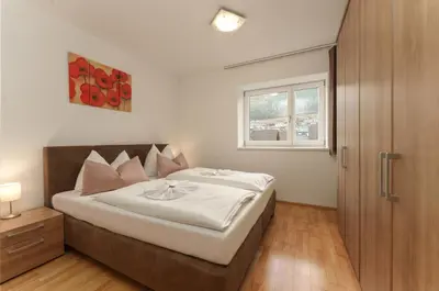 Ein Bett oder Betten in einem Zimmer der Unterkunft Appartementhaus Crystal by Schladming-Appartements