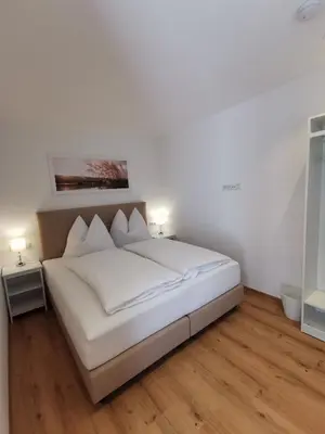 Ein Bett oder Betten in einem Zimmer der Unterkunft Feine Bleibe
