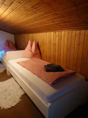 Ein Bett oder Betten in einem Zimmer der Unterkunft The Loft