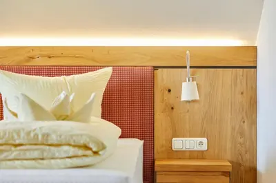 Ein Bett oder Betten in einem Zimmer der Unterkunft Appartement Traumblick mit Indoorpool und privater Sauna