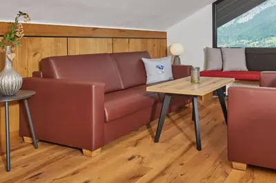 Ein Sitzbereich in der Unterkunft Appartement Traumblick mit Indoorpool und privater Sauna