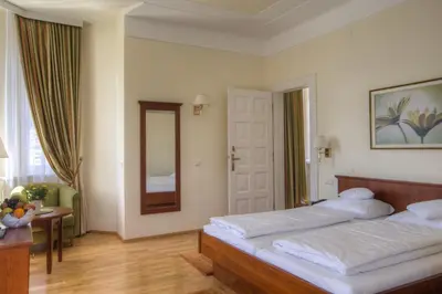 Ein Bett oder Betten in einem Zimmer der Unterkunft Seehotel Billroth